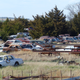 Image for article titled Help Us Spot the Incredible Cars in This Kansas Junkyard